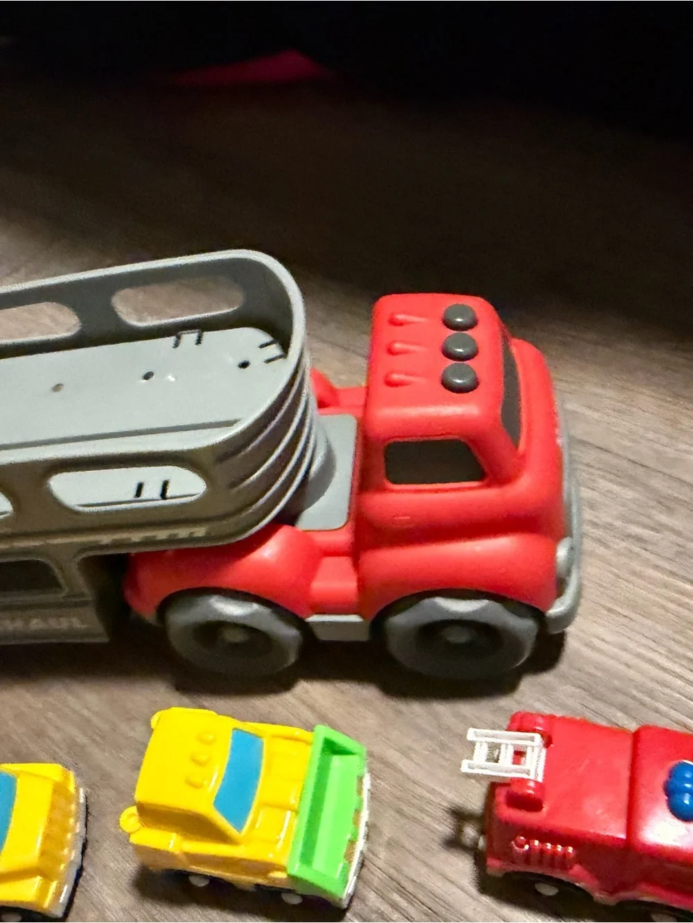 Kids Red and Gray Haul Truck Playset with 6 Mini Vehicles (cop, firetruck, etc)